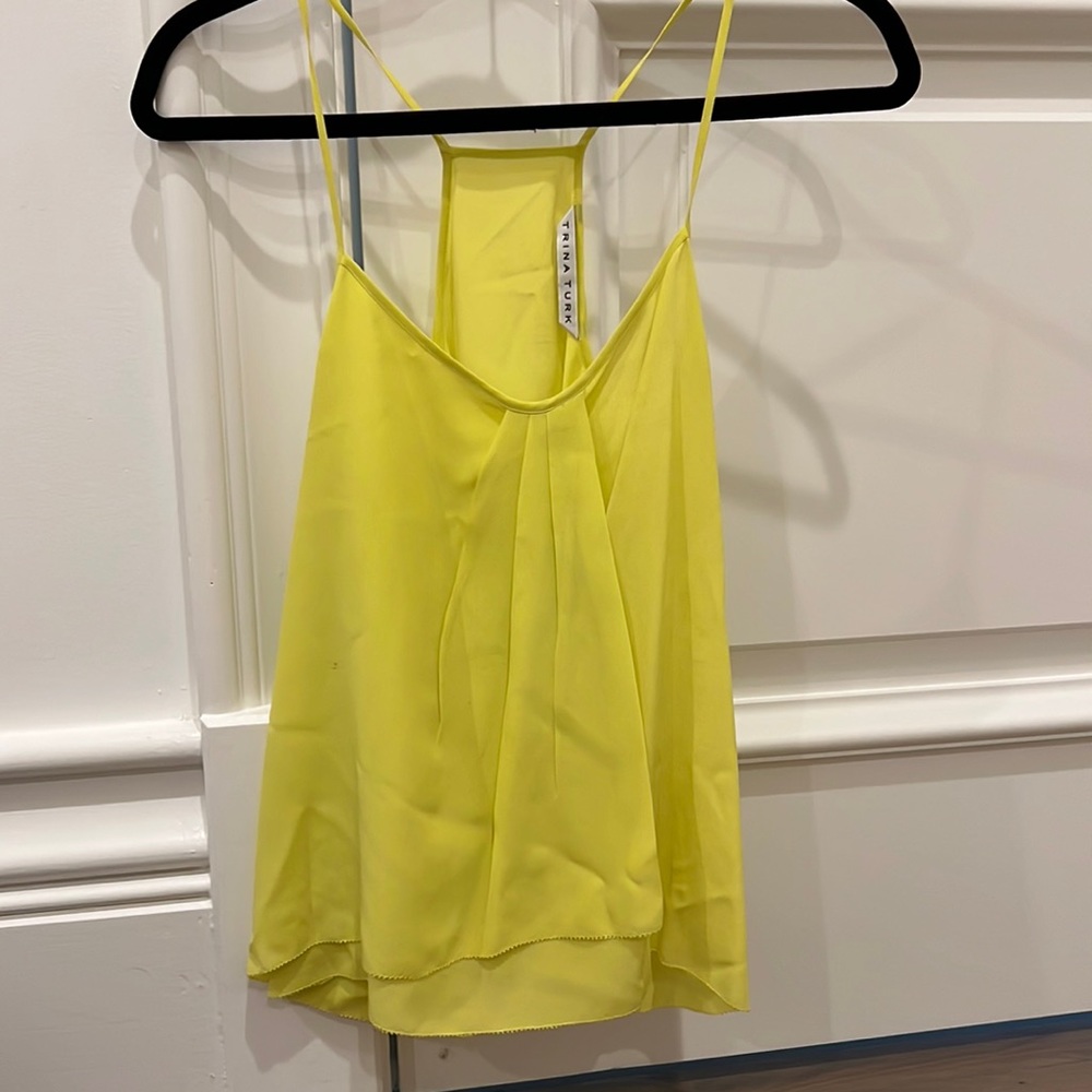 Trina Turk tank top. Minor stains as shown in photos. Size xs